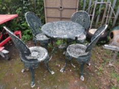 A CAST ALUMINIUM FOUR SEAT GARDEN TABLE SET