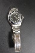 A MENS STAINLESS STEEL DIVERS WATCH BY GROVANNA WITH SWISS RONDA JEWELLED MOVEMENT