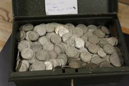 A METAL TIN CONTAINING MANY PRE- 1947 COINS TO INCLUDE APPROXIMATELY 200 HALF CROWNS, 265 FLORINS,