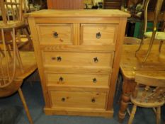 A COLONIAL STYLE FIVE DRAWER CHEST OF DRAWERS W CM
