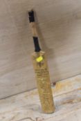 A NOVELTY MINIATURE STUART SURRIDGE 1952 SURREY COUNTY CRICKET CLUB SIGNATURE BAT