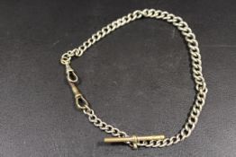 AN ANTIQUE WHITE METAL GENTLEMANS POCKET WATCH CHAIN