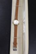 A LADIES HALLMARKED 9CT GOLD OMEGA WRISTWATCH