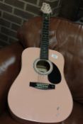 A PINK STAGG ACOUSTIC GUITAR WITH CARRY CASE