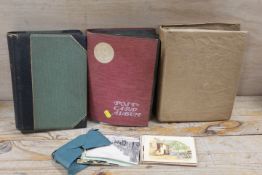 A TRAY OF POSTCARD ALBUMS ETC