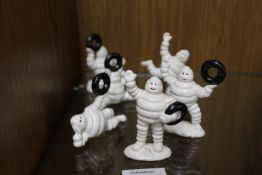 *FIVE ASSORTED SMALL CAST METAL MICHELIN FIGURES