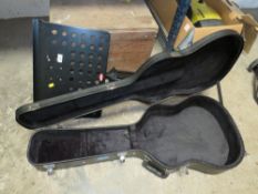 A CHASE GUITAR CASE AND A STAGG MUSIC STAND