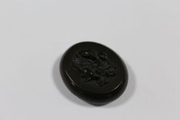 AN ANTIQUE JET LOCKET