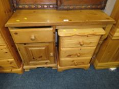 A MODERN HONEY PINE DESK AND A BEDSIDE CHEST (2)