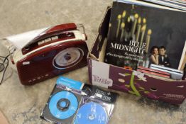 A MODERN RETRO STYLE RADIO TOGETHER WITH A SMALL QUANTITY OF LP RECORDS ETC