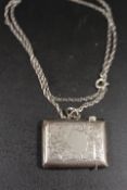 AN ANTIQUE SILVER VESTA CASE ON 24