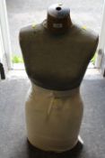 A VINTAGE DRESSMAKER'S DUMMY