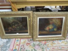 A PAIR OF GILT FRAMED STILL LIFE PAINTINGS ON GLASS