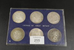 A SELECTION OF SIX CROWN COINS DATING FROM 1889 TO 1935