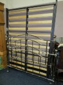 A MODERN METAL BED FRAME - W 140 CM