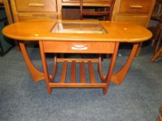 A MODERN G-PLAN BIJOUTERIE TABLE WITH DROP LEAVES