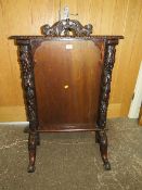 A CARVED OAK SCREEN 95 X 66 CM