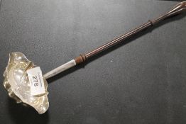 AN EARLY HALLMARKED SILVER LADLE WITH TURNED WOODEN HANDLE