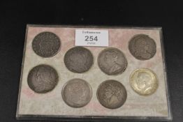 A SELECTION OF HALF CROWNS TO INCLUDE A REPLICA OLIVER CROMWELL EXAMPLE TO GEORGE V SHEILD BACK 1915