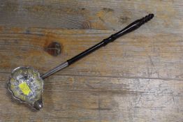 A GEORGIAN HALLMARKED SILVER LADLE WITH EBONY HANDLE
