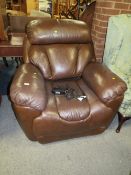 A BROWN LEATHER ELECTRIC ARMCHAIR