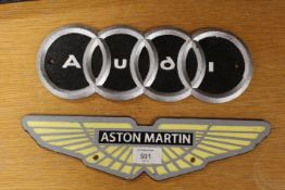 ***AN ASTON MARTIN PLAQUE TOGETHER WITH AN AUDI PLAQUE (2)**