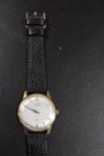 A HALLMARKED 9CT GOLD WRISTWATCH BY LONGINES