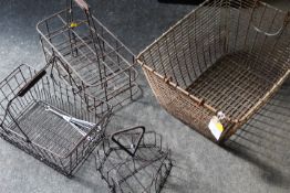 FOUR VINTAGE WIRE WORK BASKETS TO INCLUDE A EIGHT SECTION BOTTLE CARRIER