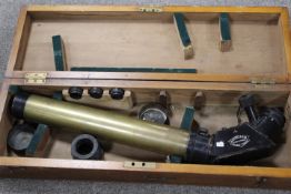 AN ANTI AIRCRAFT GUN SIGHT IN WOODEN CASE