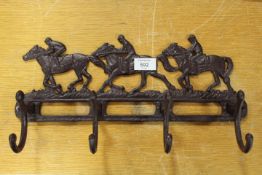***A CAST HORSE RACING THEMED COAT RACK **