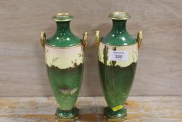 A PAIR OF HAND PAINTED COALPORT VASES