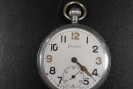 A VINTAGE BRITISH MILITARY POCKET WATCH BY HELVITIA
