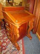 A REPRODUCTION MAHOGANY DAVENPORT