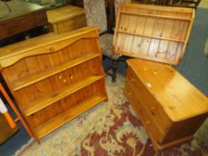 A HONEY PINE TWO DRAWER CHEST AND TWO RACKS (3)