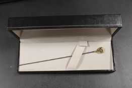 A VINTAGE PIERCED HAT PIN