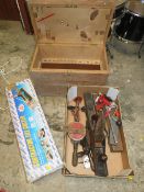 A WOODEN CARPENTERS TOOL BOX WITH VARIOUS WOODWORKING TOOLS AND A TILE CUTTER