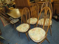 AN ERCOL REFECTORY TABLE AND SIX SWANBACK CHAIRS