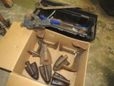 A PLASTIC TOOLBOX WITH VARIOUS TOOLS TOGETHER WITH STEEL HAND IRONS, COBBLERS LASTS AND VICE