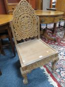 A CARVED EASTERN HARDWOOD CHAIR