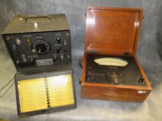 A SIGNAL CORPS FREQUENCY METER BC221 AND A CAMBRIDGE INSTRUMENT MICROAMP METER