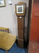 A VINTAGE OAK GRANDMOTHER CLOCK