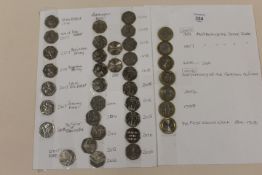 A COLLECTION OF ASSORTED FIFTY PENCE PIECES TO INCLUDE PETER RABBIT EXAMPLES, PADDINGTON BEAR ,