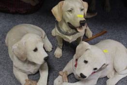A SELECTION OF RESIN AND CERAMIC DOG FIGURES