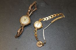 A HALLMARKED 9CT GOLD CASED WRIST WATCH ON EXPANDABLE BRACELET TOGETHER WITH A GOLD PLATED EXAMPLE
