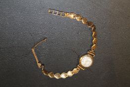 A HALLMARKED 9CT GOLD RODANIA WRIST WATCH APPROX WEIGHT 11.3 G