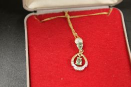 HALLMARKED 9CT GOLD GEMSET PENDANT AND CHAIN
