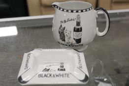 A VINTAGE BLACK AND WHITE WHISKY 