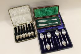 THREE CASED HALLMARKED SILVER SETS TO INCLUDE AN ORNATE PAIR OF ROPE TWIST STEM BUTTER KNIFES