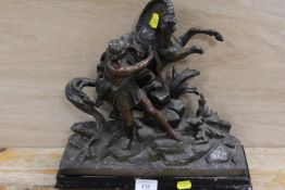 A VINTAGE BRONZED SPELTER STUDY OF A FIGURE AND HORSE - DAMAGE TO HORSES LEG