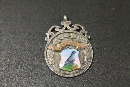 ANTIQUE SILVER, GOLD AND ENAMEL PIGEON FANCIERS FOB MEDAL